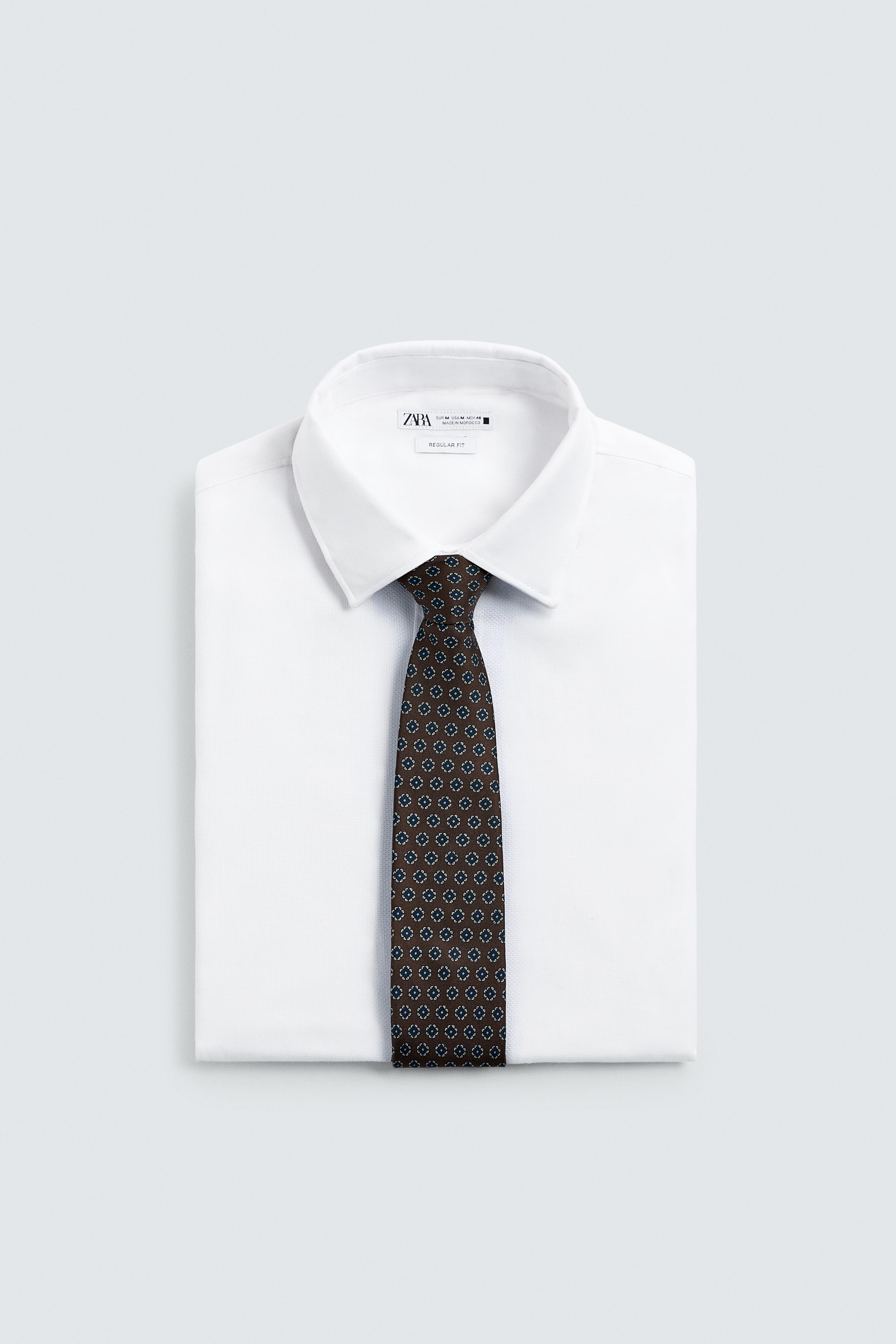 CRAVATE JACQUARD GÉOMÉTRIQUE 100% SOIE